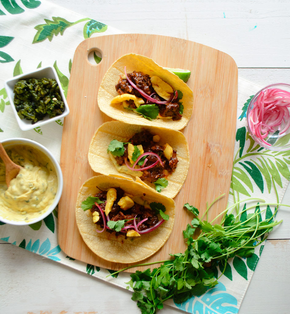 Oxtail-Tacos-with-Ackee-Butter-Bean-Puree roasted poblano and pickled ackees and onion - recipe